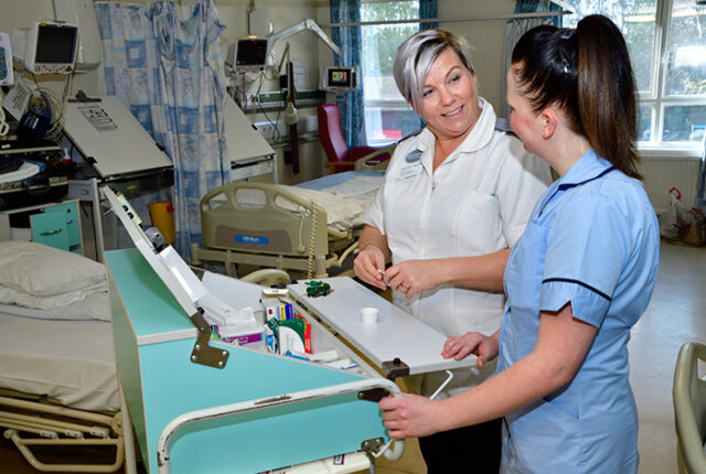 Nursing associates working at a desk